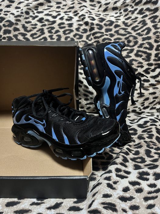 Nike Air Max Plus in the black and University Blue colorway.