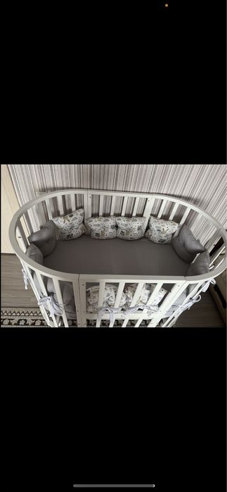 Кроватка 8 в 1 с маятником