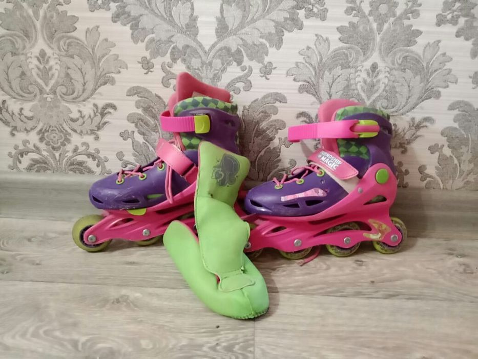 Роликовые коньки