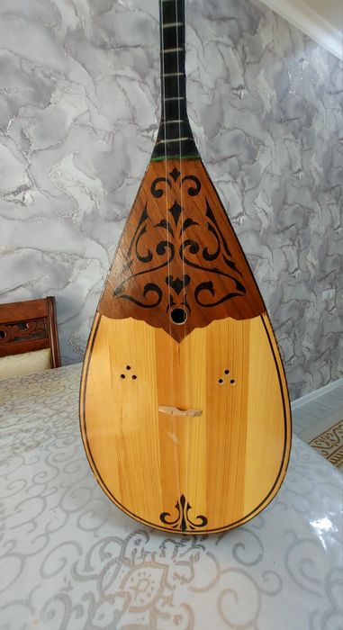 Домбыра кәсіби,үні ашық