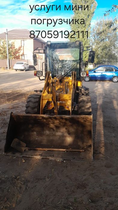 Услуга эвакуатор мини погрузчик каток 5 тонн