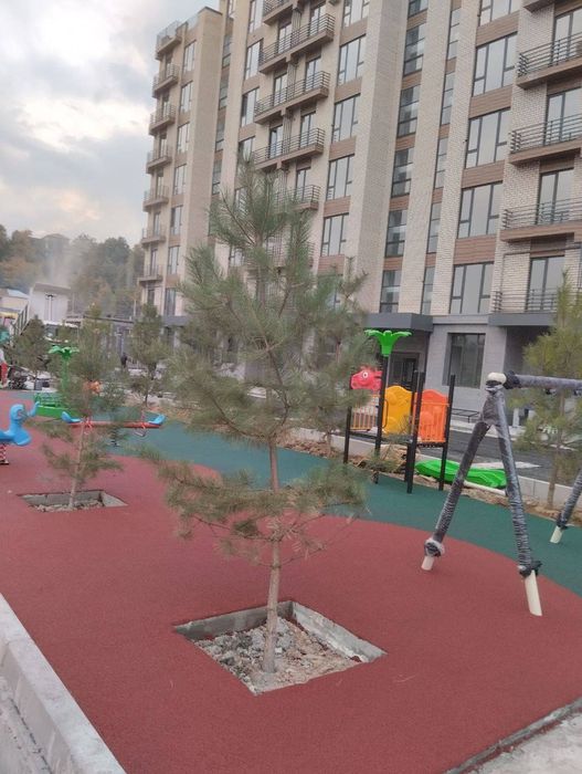 резиновые покрытие, на детской площадке резина коплама турги цехдан