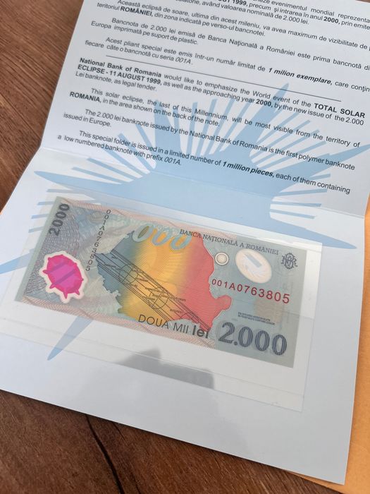 Bancnota 2000 lei eclipsa 1999