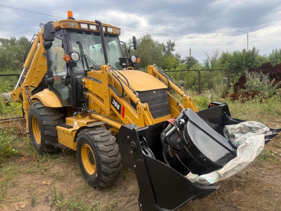 Экскаватор погрузчик новый 388