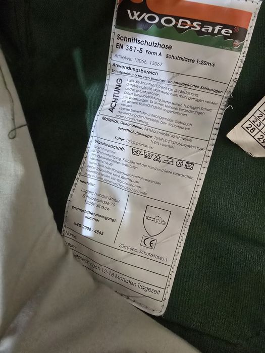 Pantaloni cu protecție la taiere cu drujba, circular sau  flex