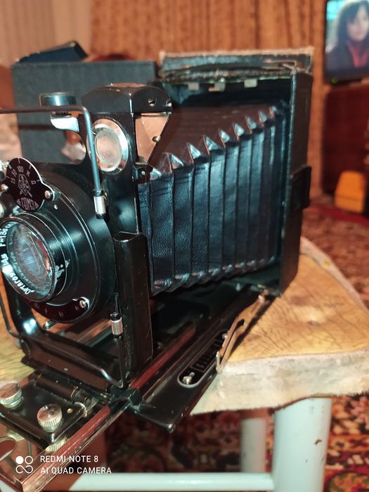 Старинный коллекционный фотоаппарат