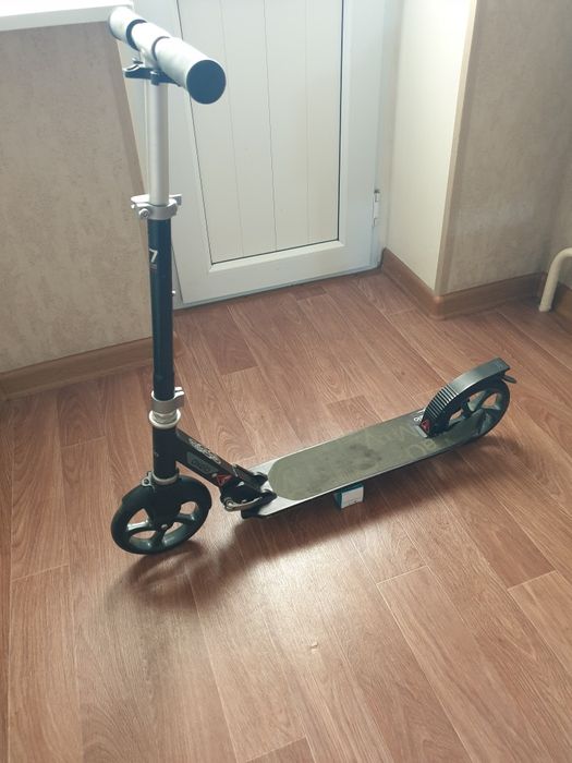 Продам самокат б/у фирменный Oxelo mid 7.