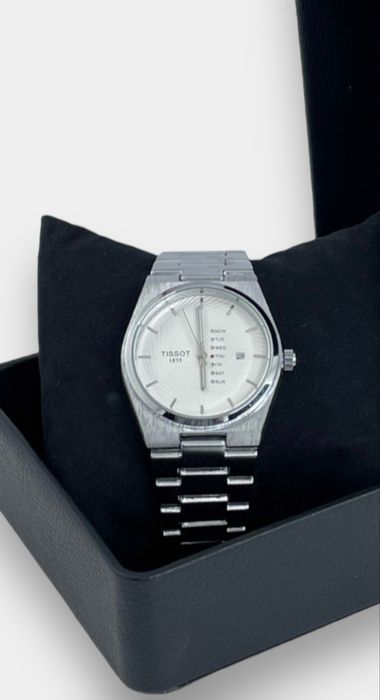 Часы Tissot металические белого цвета