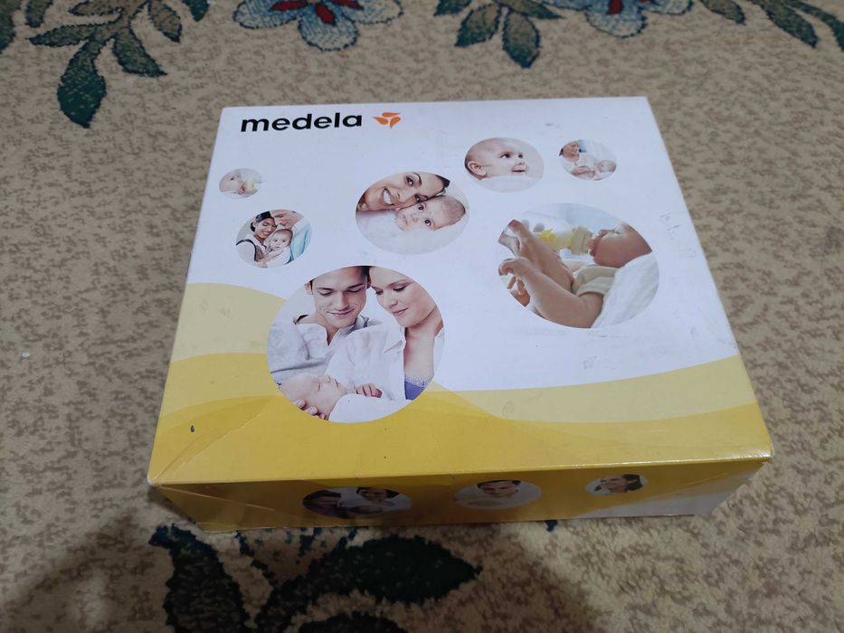 Электрический молокоотсос модель Medela Mini Electric