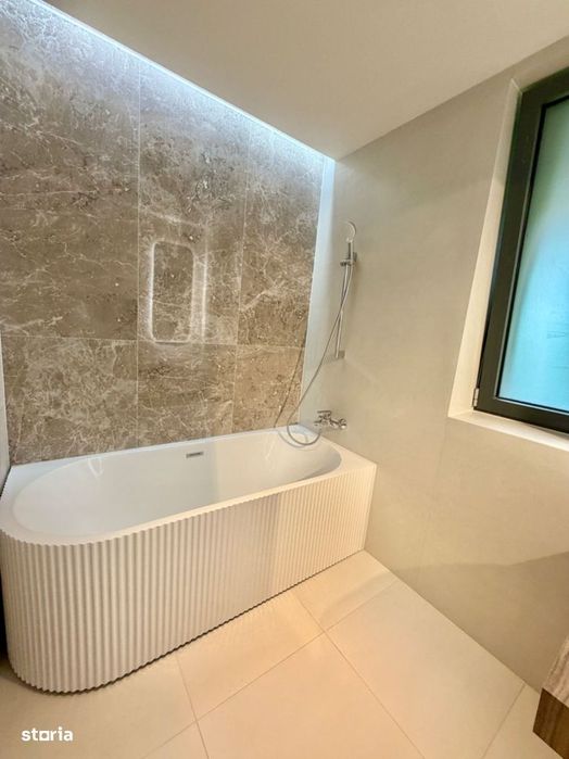 Apartament exclusivist cu 4  camere și grădină / 2 locuri de parcare