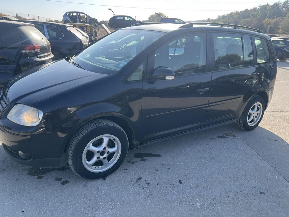 Vw Tuaran 1.9 105кс.код на мотора BKC 2006 г