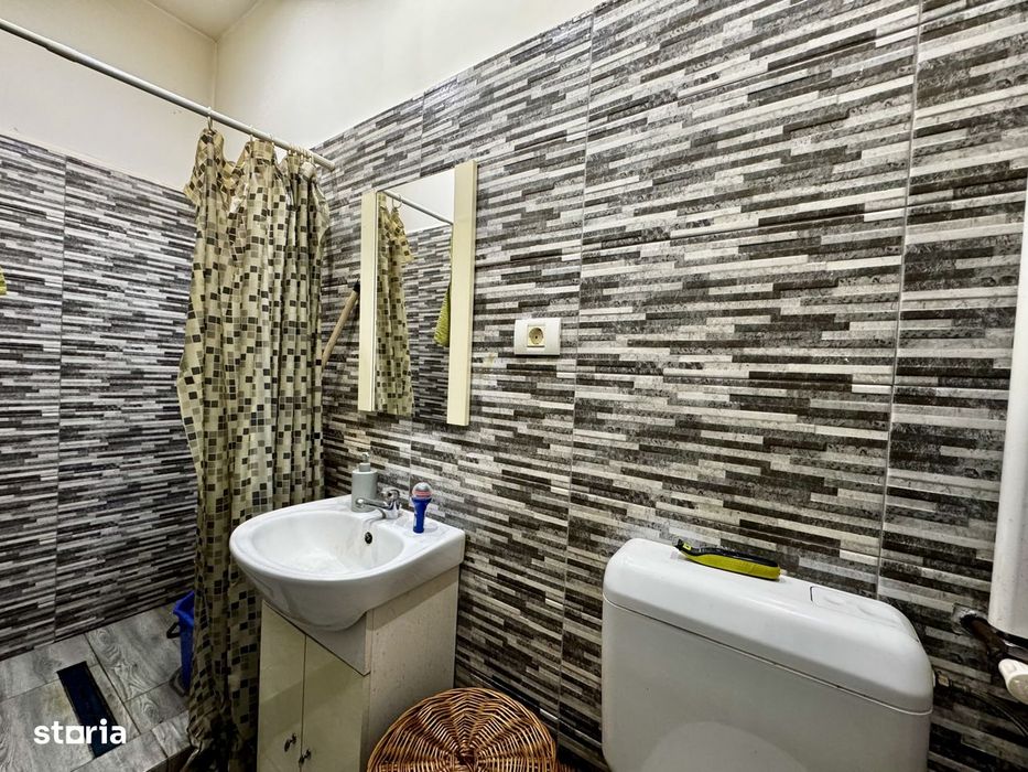 Apartament situat in zona centrala, etaj 1, centrala proprie
