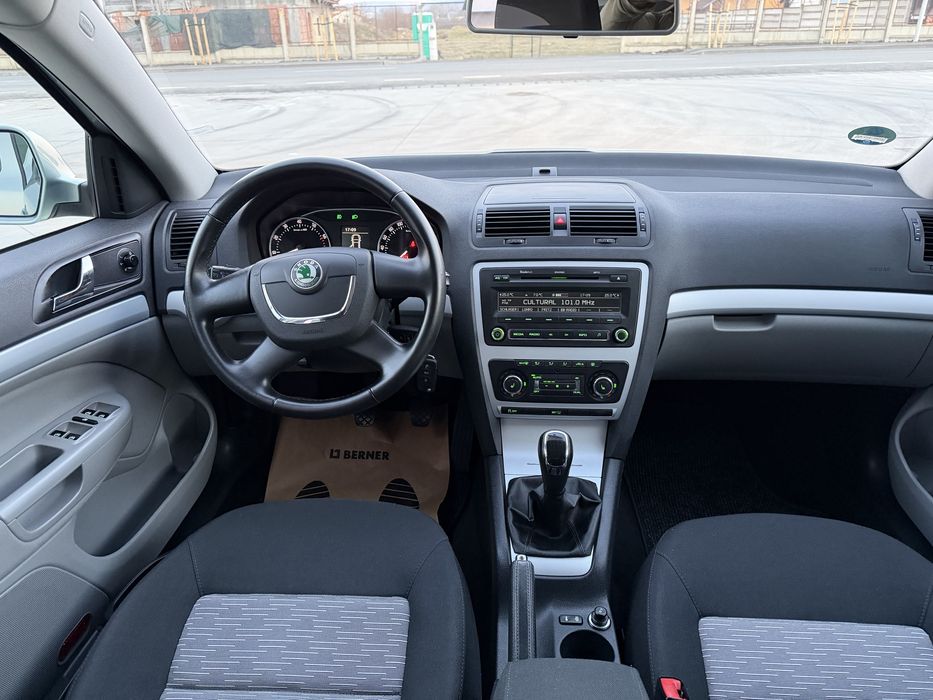 • Skoda Octavia •Model Elegance • 1.4 TSI • 122 CP • An 2011 • Euro 5 • Impecabila •