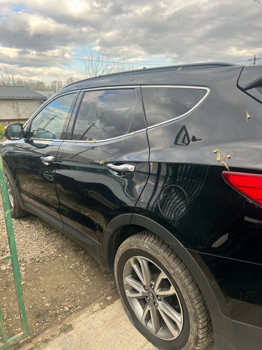 Aripă stânga spate Hyundai Santa Fe 2014