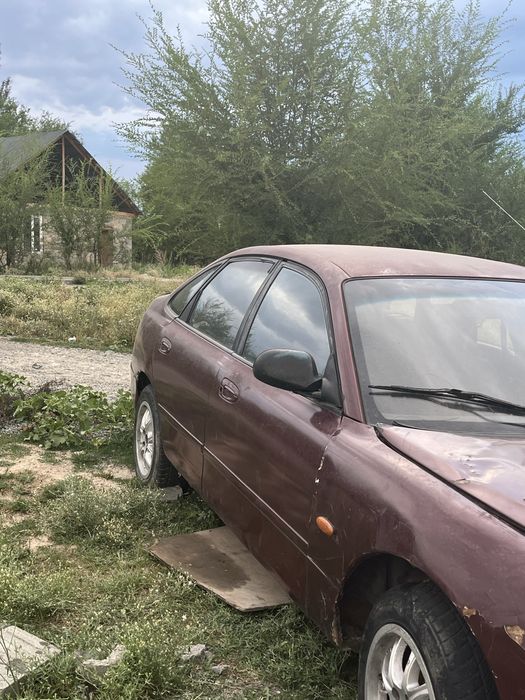 Продам машину мазда кронс