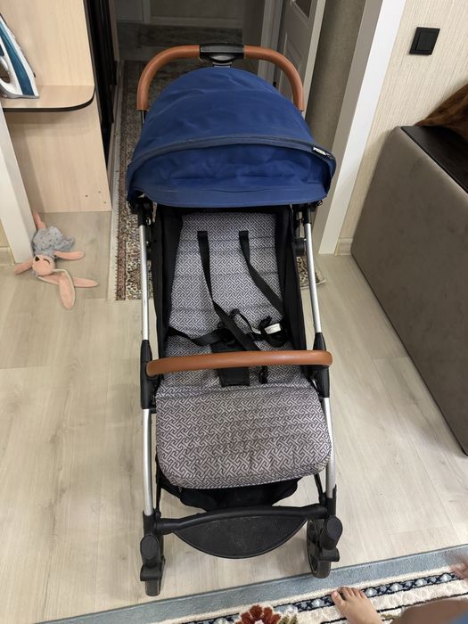 Детская коляска для ребенка универсал