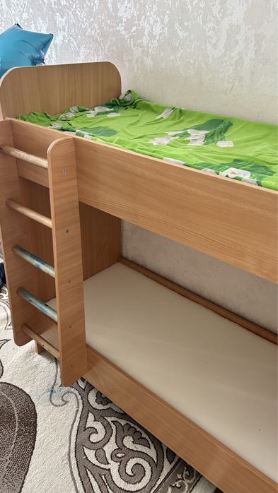 Двухярусная детская кровать