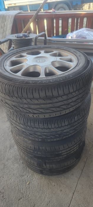 Capota Touran 2008+4 roti de vara Bridgestone