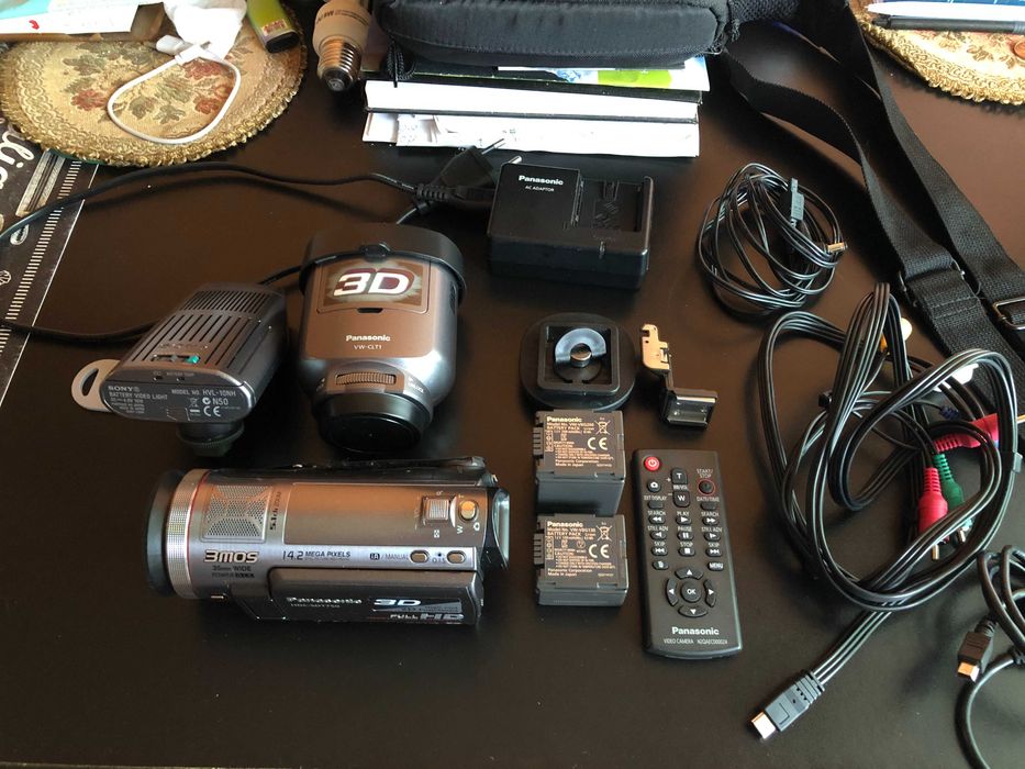 Panasonic HDC-SDT750 Full HD 3MOS SD XC Camcorder 14.2 MP 3D capable,Touch Screen,VW-CLT1 3D Conversion Lens (With Lens Caps and Pouch),