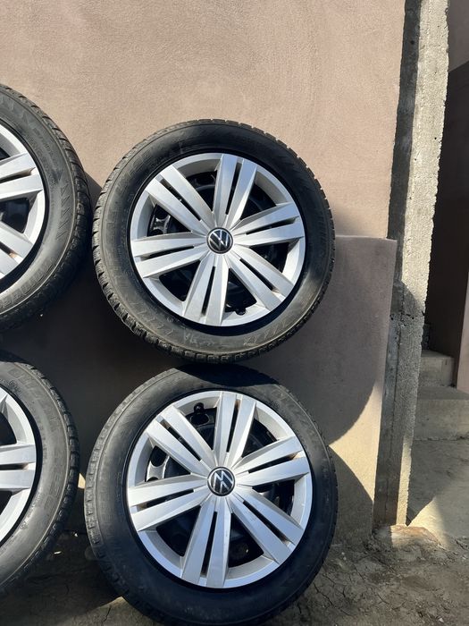 Set 4 jante tablă VW Golf 5 R16 + anvelope 205/55 R16 + 2 seturi capace VW