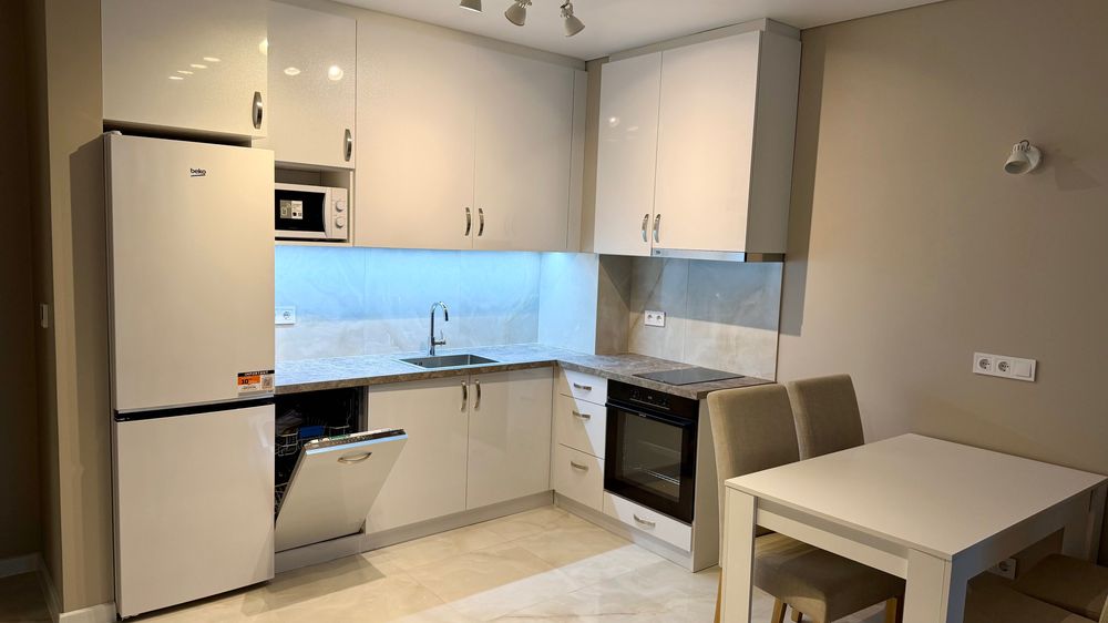 Нов двустаен апартамент с морска гледка + подземен паркинг