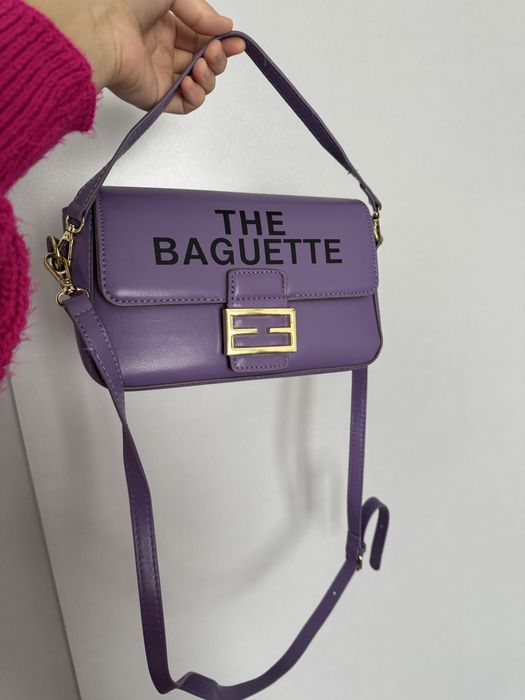 Ayollar uchun sumka. Yelkama va tutgichli