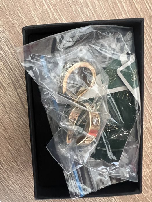 Золотые сережки Cartier