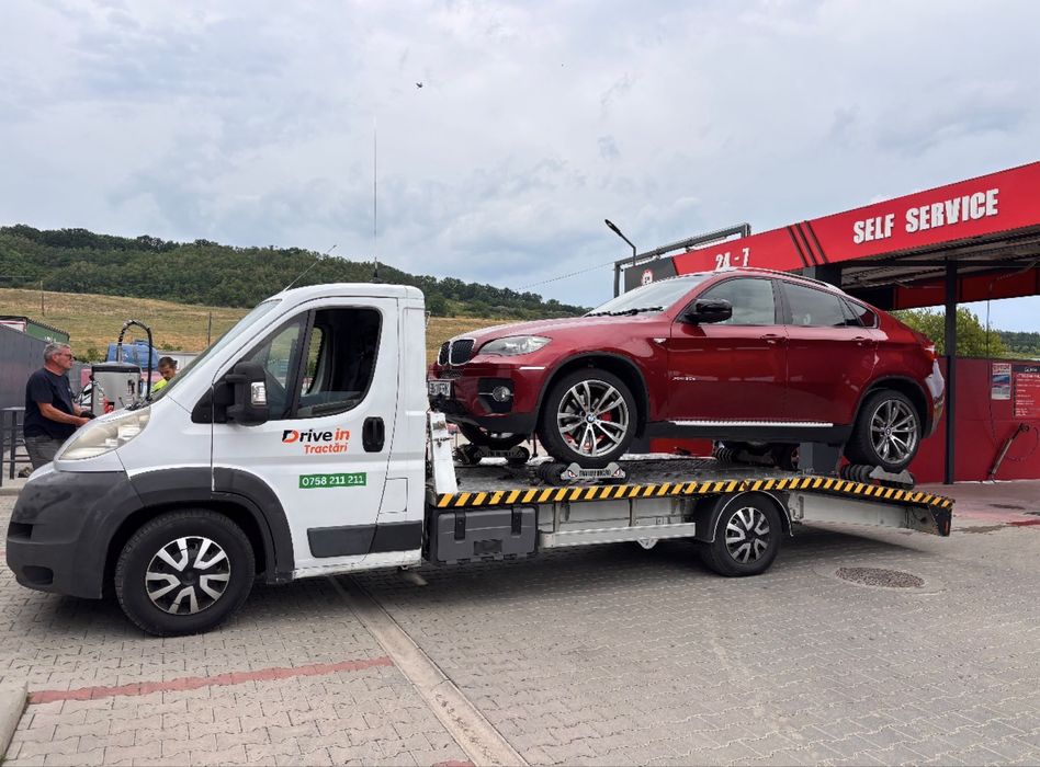 Tractari auto Sibiu,recuperare din autostrada ,utilaje, platforma