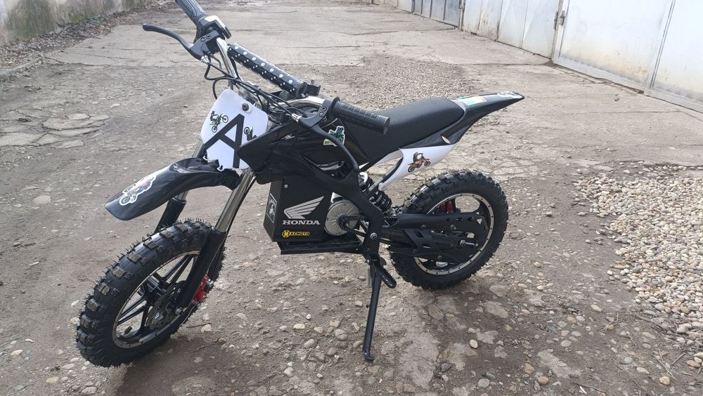 Motocicleta electrica de cross pentru copii