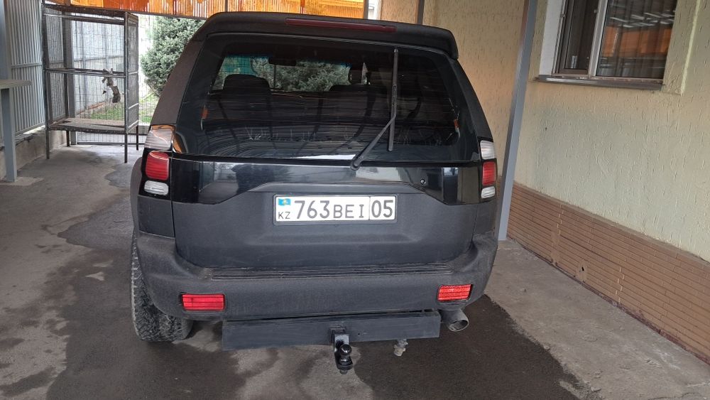 Митсубиси Монтеро Спорт.