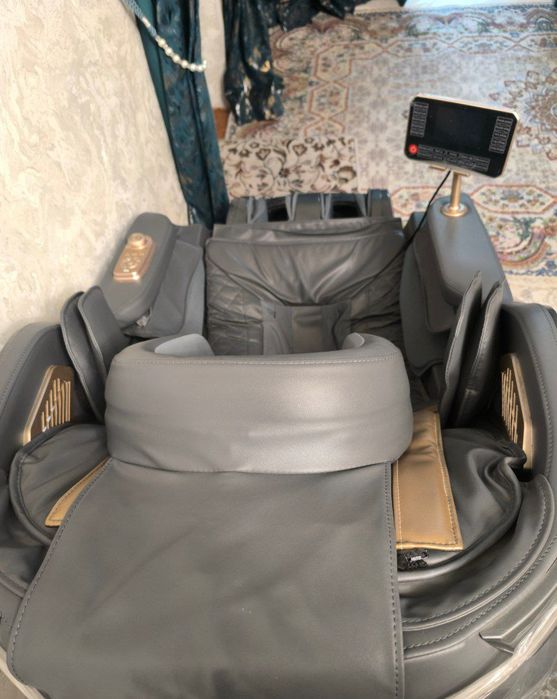 Массажный кресло