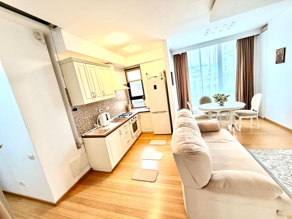 Proprietar, vand apartament de 2 camere vis-a-vis de Casa Poporului, in bloc nou tip boutique , cu SU 65 mp si 40 mp curte comuna