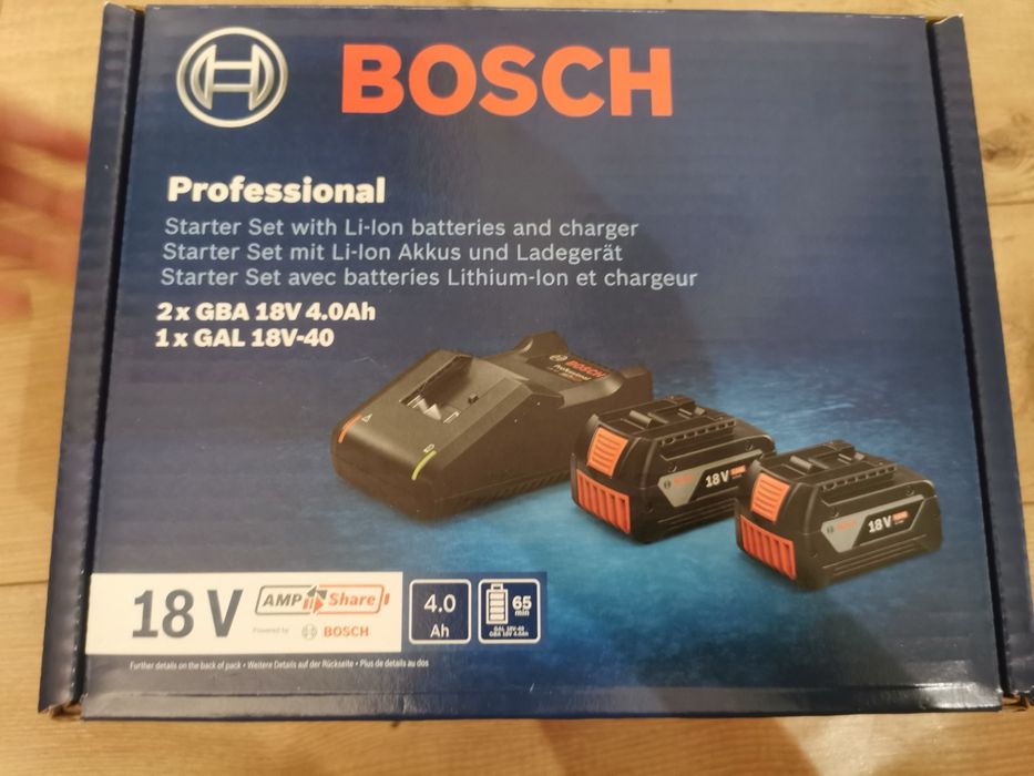 Компленк Батерии Bosch GBA 4AH+зарядно
