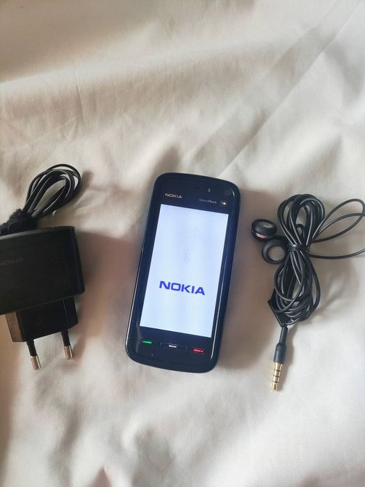 Nokia  5800 XP + accesorii ( decodat, lifetimer 32:36)