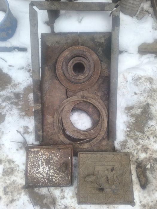 Чугунная плита с кольцами и дверцы