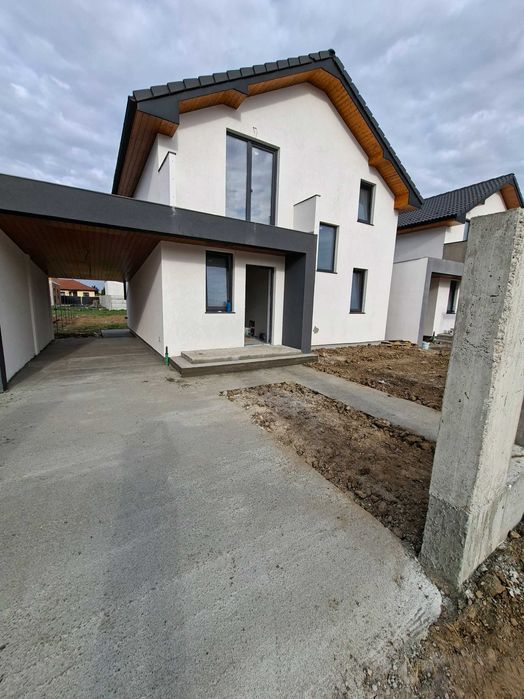 Casă nouă P+M în Mărtinești –cu 3 camere+living, parcare acoperita și teren 450mp