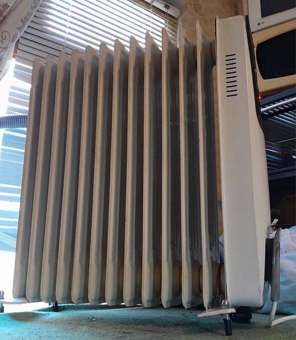 Масляный обогреватель