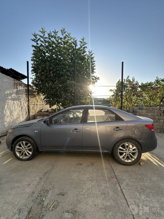 Kia forte 2009 xolati ortacha remont qivorish kerak