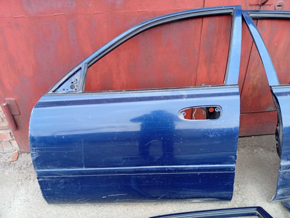 Двери Mazda Cronos Хэтчбек