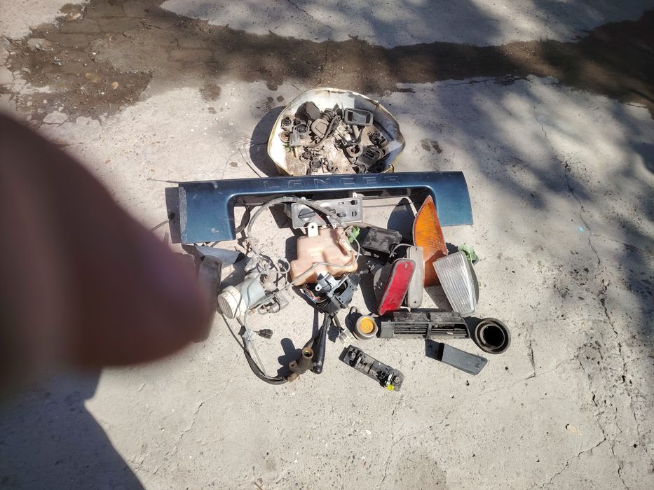 Продам б/у з/ч на Лансер