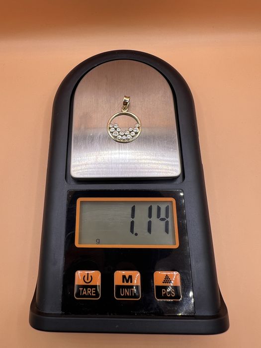 Продам золотой кулон.