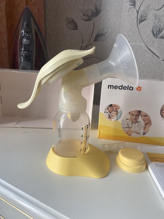 Молокоотсос Medela