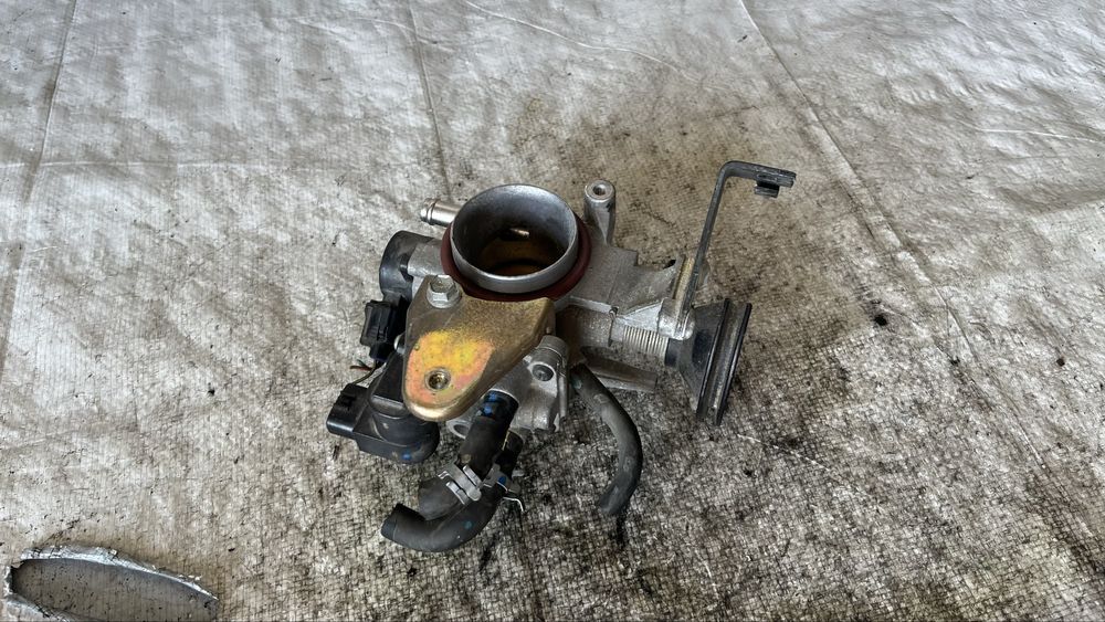 Daihatsu Sirion 1998- 1.3i дросел