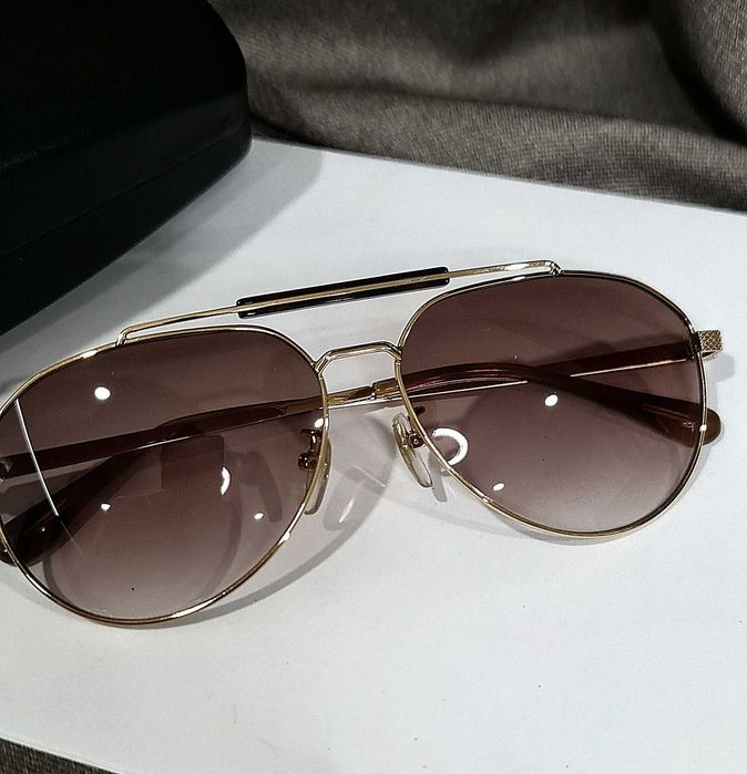 Солнцезащитные очки Dunhill.