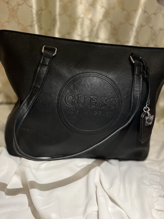 Geanta nouo de culuare neagra medie spatioasa ati ancap multe an ea