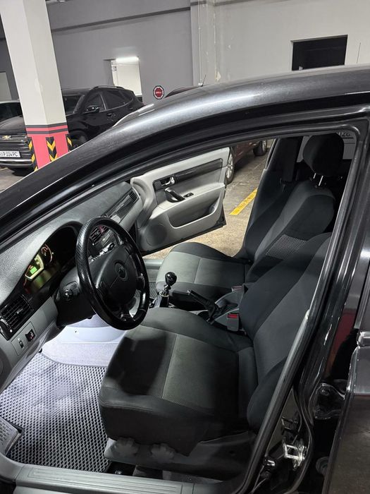 Lacetti 2010 mexanika 1.8