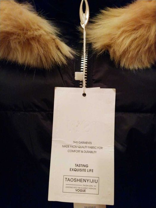 Продам новый зимний пуховик