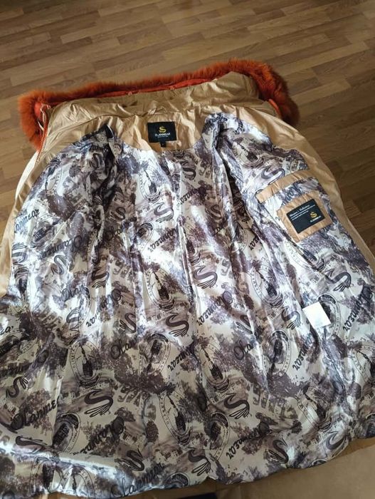 Зимний пуховик продам
