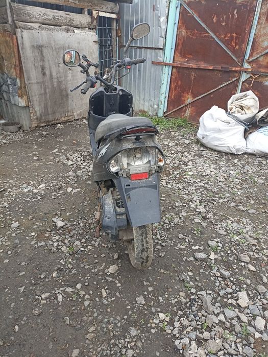 Скутер за 100000