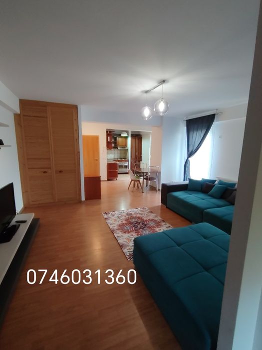 Închiriez apartament cu 2 camere + loc de parcare